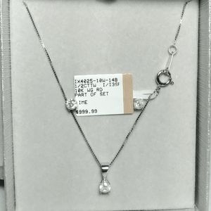 1/2 CT T.W DIAMOND PENDANT AND EARRINGS SET